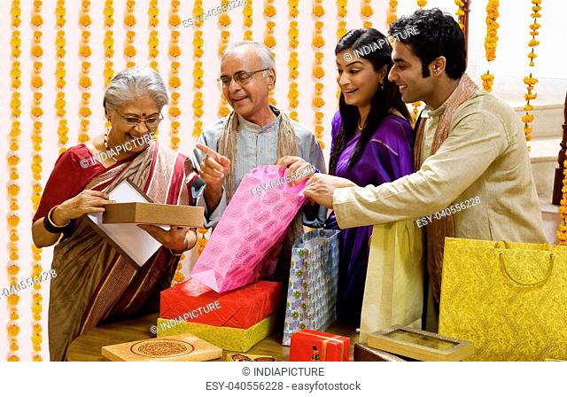 Family opening Diwali gifts