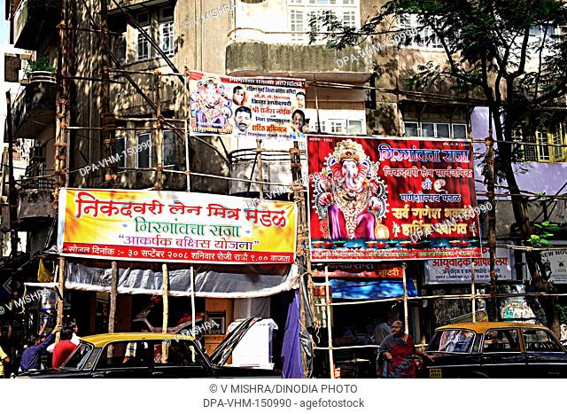 Old building sanzgiri sadan mass urban housing and festival ganesh chaturthi hording ; Charni road ; Bombay Mumbai ; Maharashtra ; India
