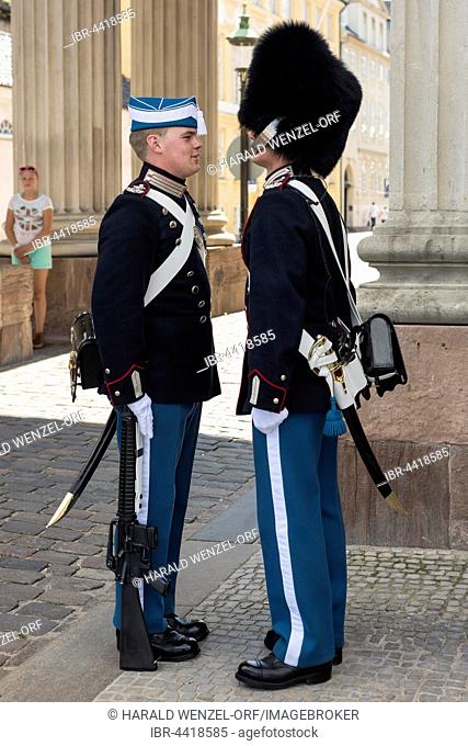 Changing of the guard, royal bodyguards on palace square, Amalienborg Palace, Copenhagen, Denmark