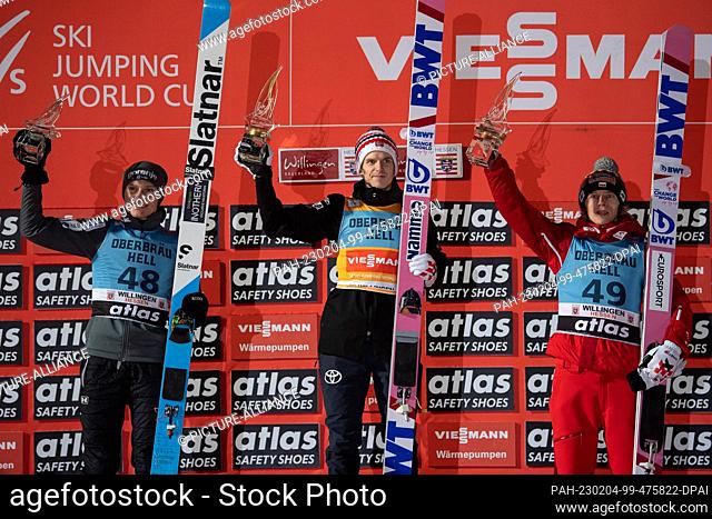 04 February 2023, Hesse, Willingen: Nordic skiing, ski jumping: World Cup, large hill, men. Halvor Egner Granerud (M) from Norway celebrates after his victory...