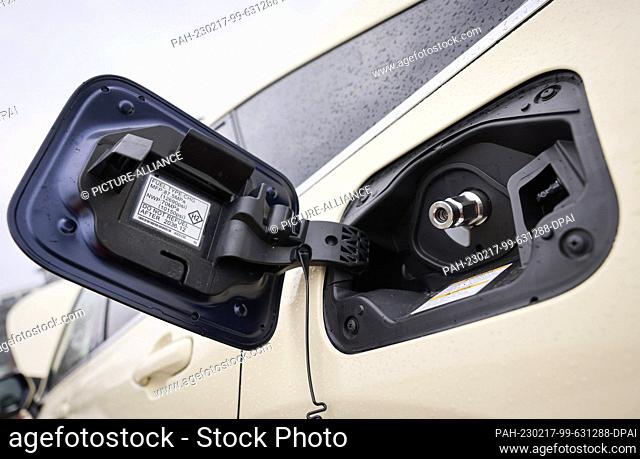 16 February 2023, Hamburg: The tank nozzle for pressurized filling with hydrogen in a hydrogen cab with fuel cell (Toyota Mirai) is seen at a media event