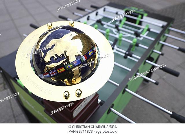 A table soccer world cup trophy stands on a foosball table during a photo call for the world cup in Hamburg, Germany, 30 March 2017
