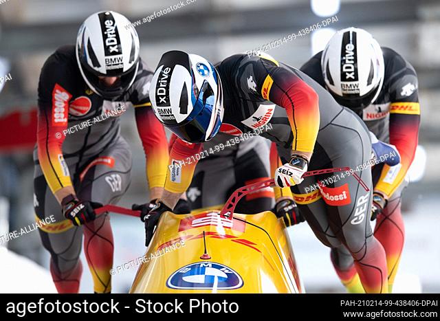 14 February 2021, Saxony, Altenberg: Bobsleigh: World Championship, four-man bobsleigh, men, 3rd run. Francesco Friedrich, Thorsten Margis