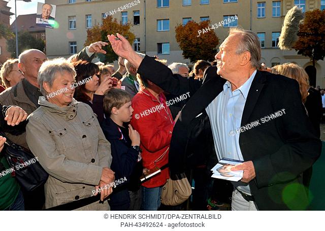 Actor Dieter Bellmann (R) attends the fan festival of the ARD television series 'In aller Freundschaft' to mark its 15th anniversary in Leipzig, Germany