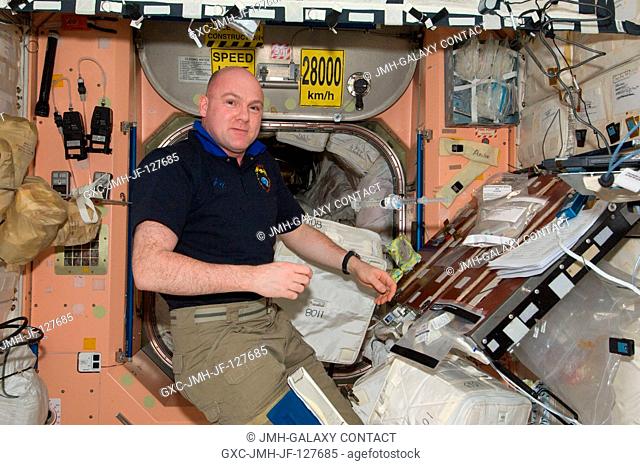 After collecting samples from the Water Recovery System (WRS), European Space Agency astronaut Andre Kuipers, Expedition 31 flight engineer