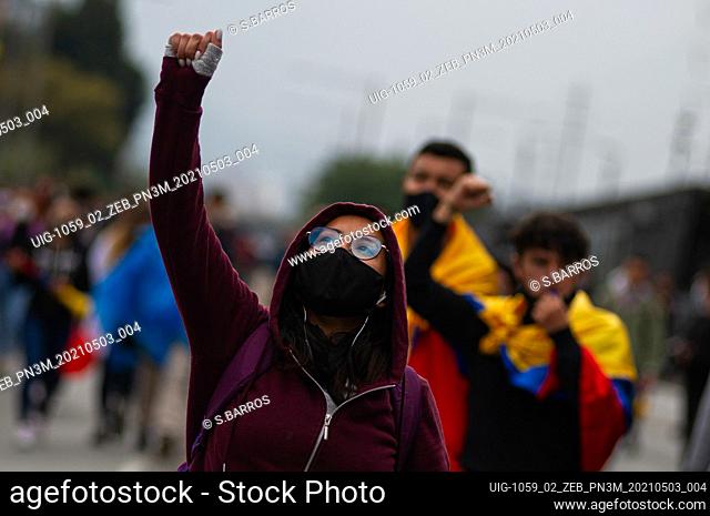 A demonstrator participates in demonstrations against a tax reform and the assasination of demonstrators by police due to the national strike in Bogota