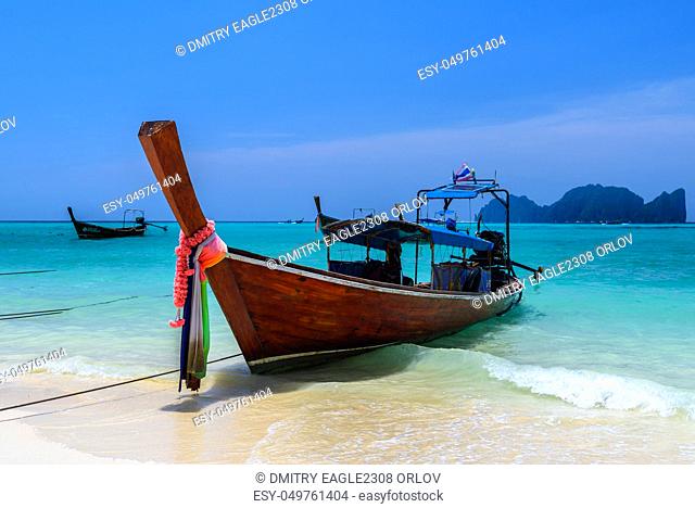 Long tail boats on tropical beach, Phi Phi Don island, Andaman sea, Krabi, Thailand