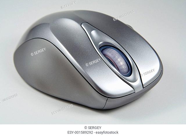 Image of cordless optical mouse on gray background