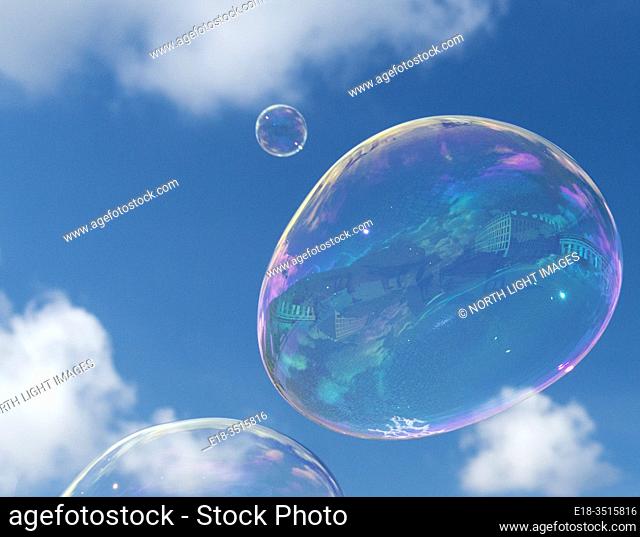 Germany, Berlin. Brandenburg Gate. Large bubbles floating in the air above Pariser Platz
