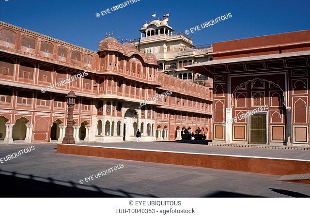 City Palace. he seven storey Chandra Mahal overlooking courtyard arround the Diwan-i-Khas on the left. Presence of the Maharaja is indicated by the flag flying...