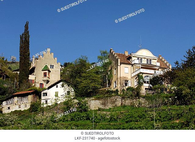 Residential houses under blue sky, Merano, Val Venosta, South Tyrol, Italy, Europe