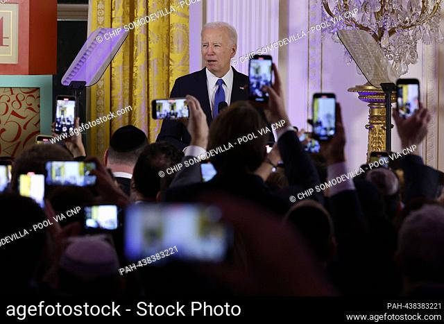 United States President Joe Biden delivers remarks during a Hanukkah holiday reception in the East Room of the White House on December 11, 2023 in Washington