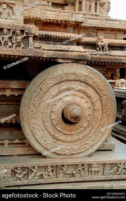 Detail of stone wheel and axle of famous Stone Chariot at Vijayavithala Temple in Hampi, Karnataka, India, Asia