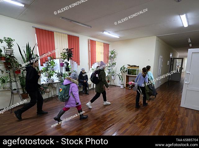 RUSSIA, ZAPOROZHYE REGION - DECEMBER 18, 2023: Kids in a hall at school No 4 in the town of Pologi. The school has 440 students who come from nearby...