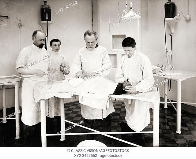Dr Ivan Pavlov (third from left) operating on a dog in the Physiology Department, Imperial Institute of Experimental Medicine, St Petersburg, Russia circa 1902