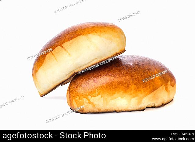 Two baked pies isolated on a white background