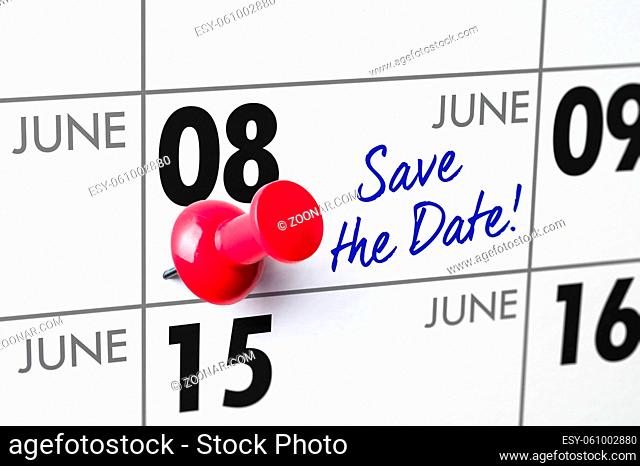 Wall calendar with a red pin - June 08