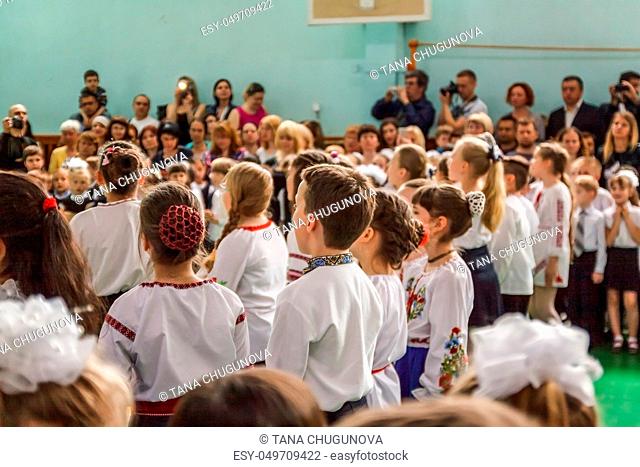 Kiev.Ukraine-May 26, 2017: Children schoolchildren on the line on the last bell sing songs, dance, recite poems, perform, receive awards