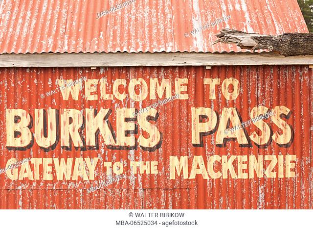 New Zealand, South Island, Canterbury, Burkes Pass, sign on corrugated metal building