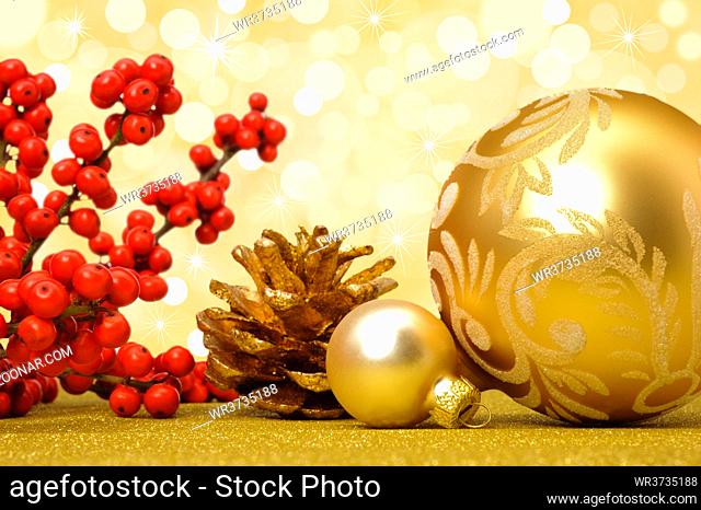 christmas decoration with fir cone and golden balls