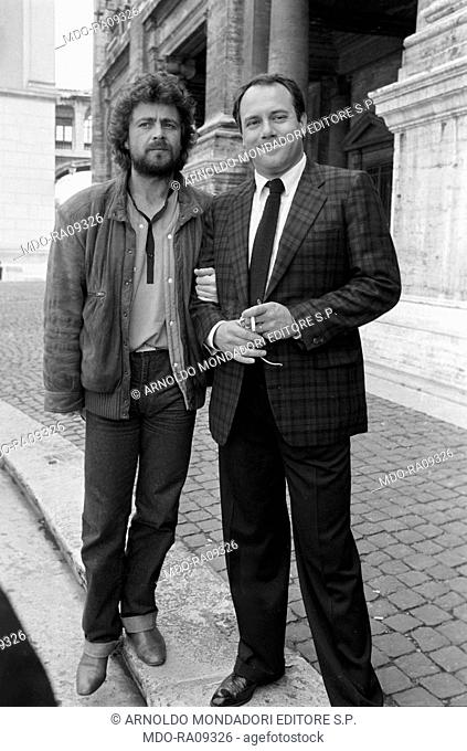 Italian actor and director Carlo Verdone and Italian comedian Beppe Grillo after the Silver Mask award ceremony. 1982