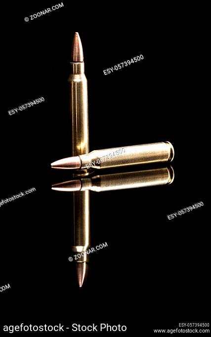 Bullets isolated on black background with reflexion