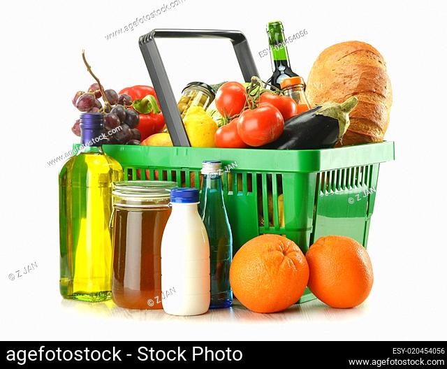 shopping basket with grocery products isolated on white