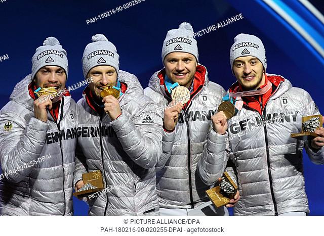 Tobias Wendl (left to right), Tobias Arlt (gold), Toni Eggert and Sascha Benecken (bronze) from Germany showing their medals during the award ceremony of the...