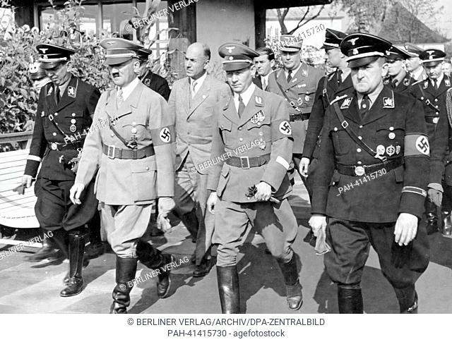 The image from the Nazi Propaganda! shows Adolf Hitler during his visit to the exhibition ""Schaffendes Volk"" (Producing Folk) in Düsseldorf, Germany