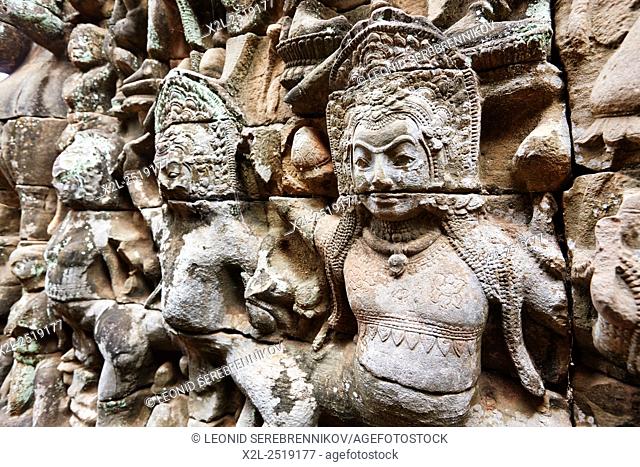 Fragment of bas-relief on Terrace of the Elephants in Angkor Thom temple complex. Angkor Archaeological Park, Siem Reap Province, Cambodia