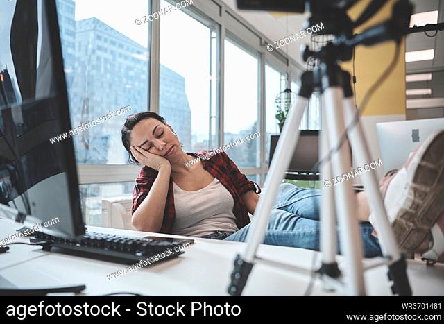 business woman making live video online meeting and get sleep