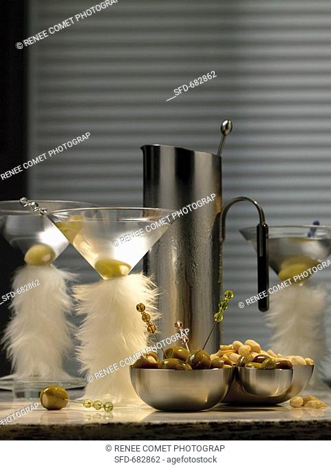 Martinis in glasses decorated with feathers