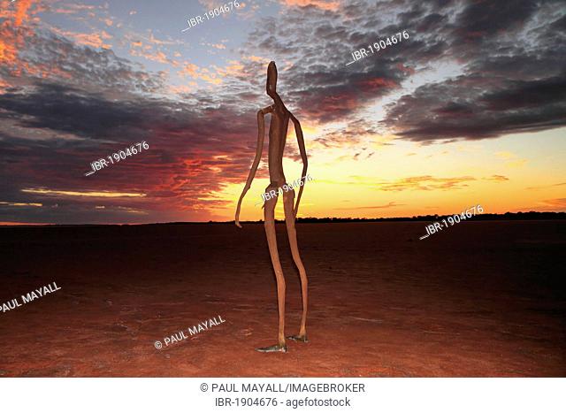 Sculpture by Antony Gormley, Inside Australia exhibition, on Lake Ballard at sunrise, Western Australia