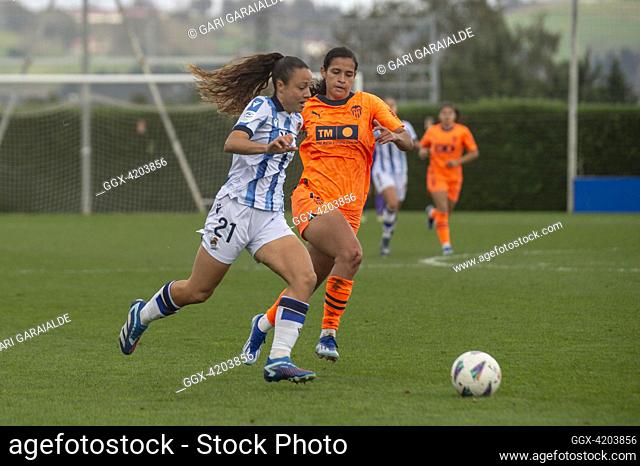 Emma Ramirez of Real Sociedad and Liced Serna of Valencia CF in action during the Primera Division Femenina match between Real Sociedad and Valencia at Zubieta...