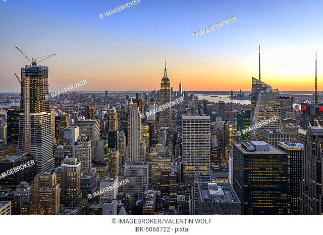 View of Midtown and Downtown Manhattan and Empire State Building from Top of the Rock Observation Center at sunset, Rockefeller Center, Manhattan, New York City