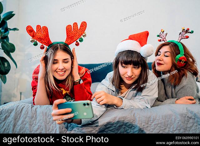 Gorgeous Smiling Female Models Having Fun And Take Selfie In Light Home Interior