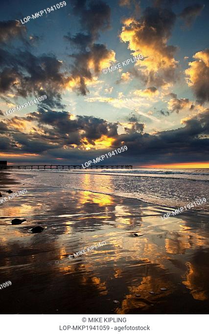 England, Redcar & Cleveland, Saltburn-By-The-Sea. Sunset over the Victorian pier at Saltburn-By-The-Sea