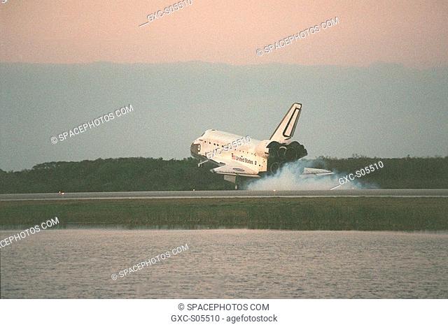 02/22/2000 -- Space Shuttle Endeavour stirs up dust as its wheels touch down on KSC's Shuttle Landing Facility Runway 33 to complete the 11-day, 5-hour
