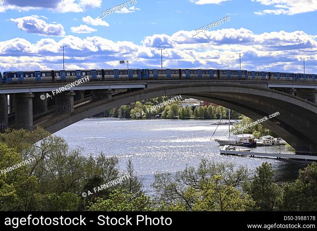 Stockholm, Sweden A tunnelbana or subway train on the Traneberg bridge