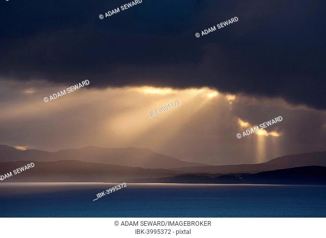 View of Lussa Point on the east coast of the Isle of Jura, looking across the Sound of Jura, at sunset, Argyll and Bute, Scotland, United Kingdom