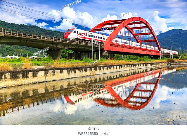 Puyuma Express go through Kecheng Iron Bridge;Taiwan