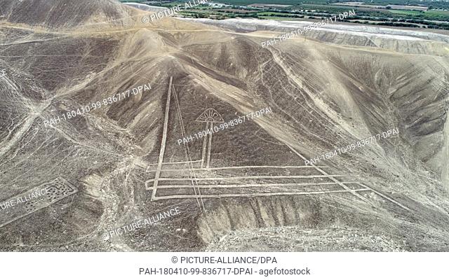 HANDOUT - 09 April 2018, Peru, Palpa: An aerial photograph of geometric figures and lines, as well as representations of animals and plants