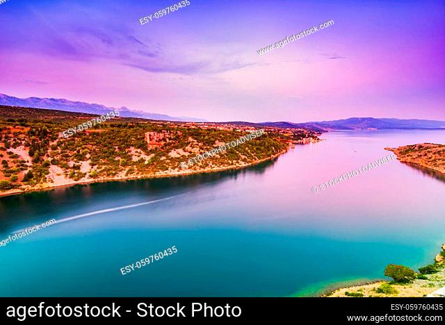 Colorful wide angle scenic view over Novigrad Sea and Maslenica town from Maslenica bridge in Dalmatia, Croatia. Wide angle and long exposure image