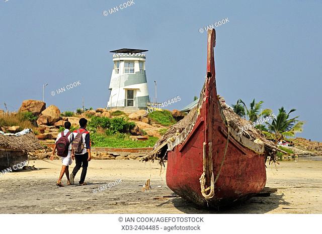 beached fishing boat, Lighthouse Beach, Kovalam, Kerala, India