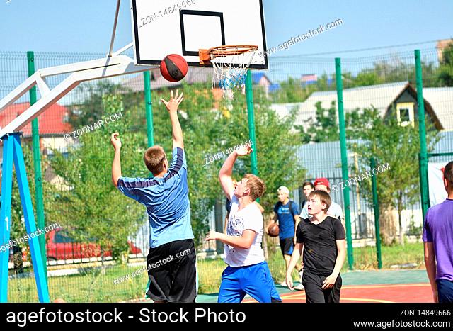 Orenburg, Russia - July 30, 2017 year: men play Street Basketball in the second round of the summer Street Basketball League