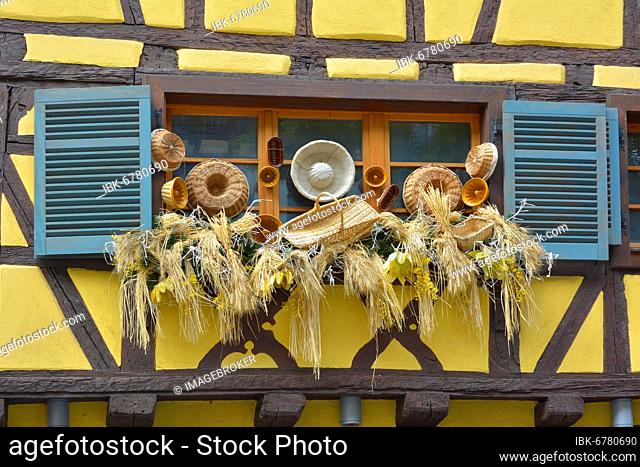France, Alsace, Colmar, city centre, old town, half-timbered houses, baskets at the window outside, biscuiterie, Europe