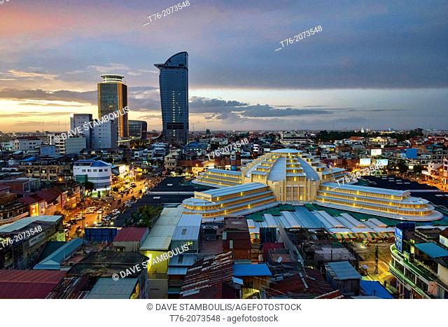 aerial view of the Art Deco Psar Thmei Central Market, Phnom Penh Tower, and city skyline, Phnom Penh, Cambodia