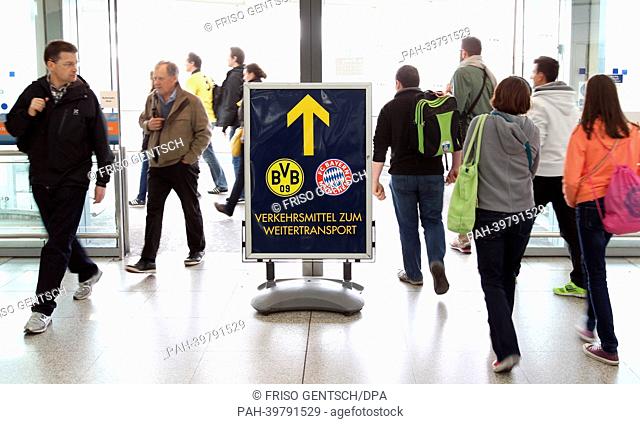 Passengers arrive at Stansted airport in London, England, 25 May 2013. FC Bayern will play in the Champions League final against Borussia Dortmund