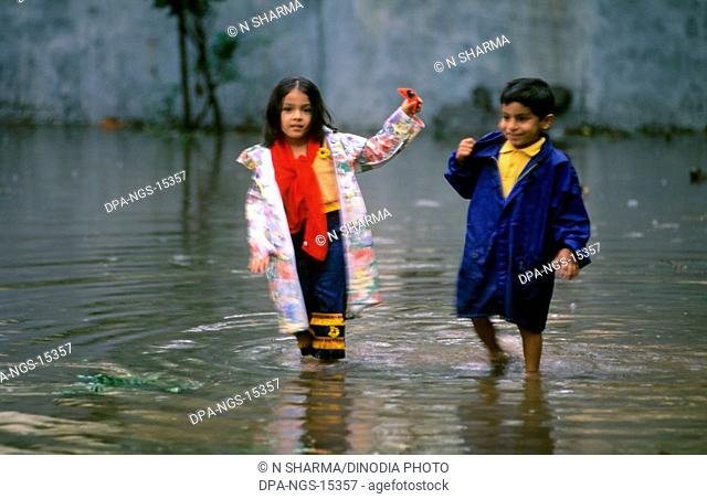 Children playing in Rain Water