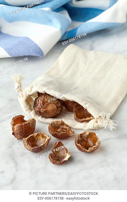 Nutshells of soapnuts in a cotton bag for laundry